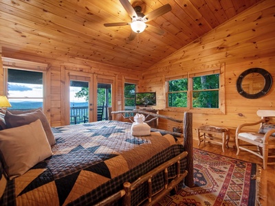 Aska Bliss- Upper level bedroom with a deck access and mountain views