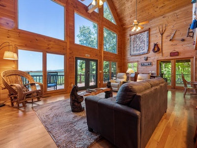 Bear Necessities- Entry level living room with floor to ceiling windows