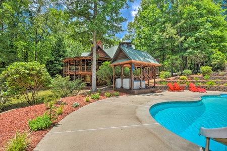 Deer Watch Lodge- Pool House view with beautiful landscaping