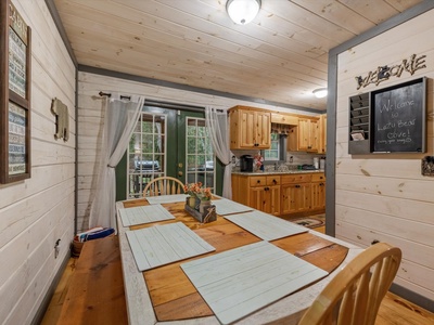 Lazy Bear Cove- Dining room view of the kitchen