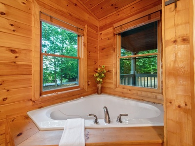 Aska Bliss- Upper level bathroom soaker tub with 2 picture windows with a view