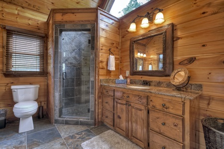 Grand Bluff Retreat- Master suite bathroom with walk in shower