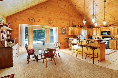 Awesome Retreat- Entry level dining area with kitchen island and bar stools