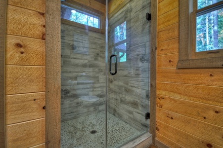 Cedar Ridge- Entry level shared full bathroom with a walk in shower