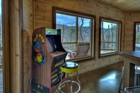 Whisky Creek Retreat- Lower level arcade game with deck view