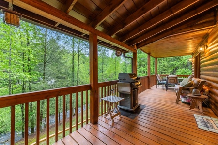 Tranquil Water - Entry Level Deck's Grill and Seating Area