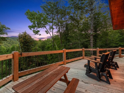 Whisky Creek Retreat- Entry deck view with rocking chairs