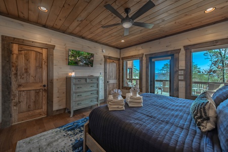 The Ridgeline Retreat- Lower level king bedroom with deck access