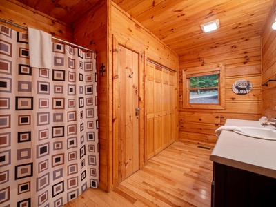 Aska Bliss- Bathroom with a large closet and step in shower