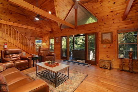 Rivers D Lite - Family Room Features Gas Fireplace, Reclining Seating, and Views of The Toccoa River