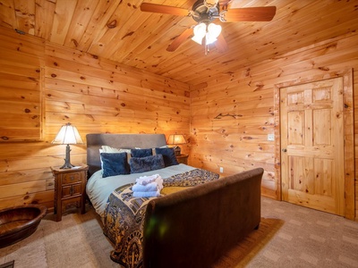 Aska Bliss- Lower level bedroom with rustic cabin walls