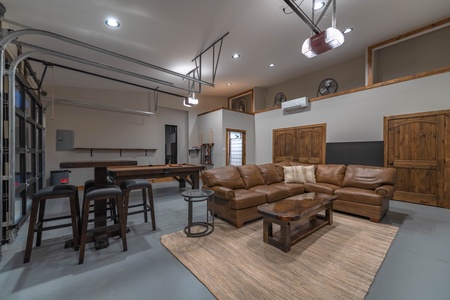 Cohutta Mountain Retreat- Garage game room with card table and lounge space