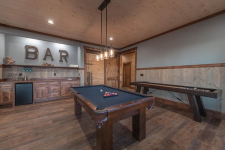 Southern Star- Lower level game area pool table, shuffle board and wet bar