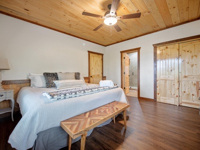Aska Favor- Lower level guest bedroom with a private bathroom