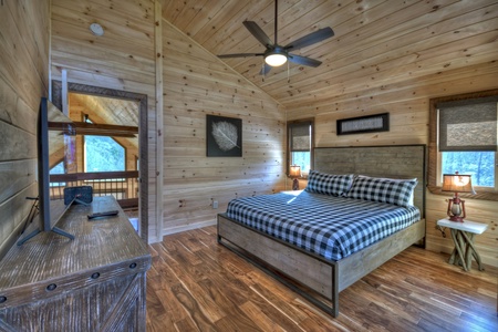 Whisky Creek Retreat- Upper king bedroom suite perspective view with TV
