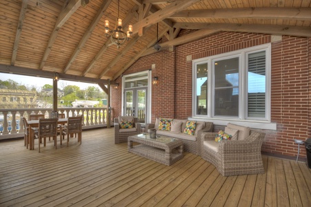 Main & Main- Covered outdoor deck with spacious seating area