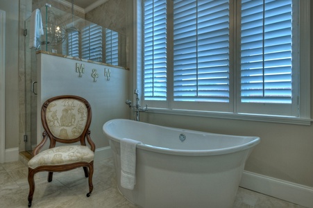 Main & Main- Master bathroom with a soaker tub