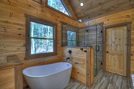 Cedar Ridge- Upper level master bathroom with a walk in shower and soaker tub