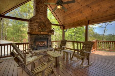 Aska Lodge- Outdoor fireplace with outdoor seating and mountain views