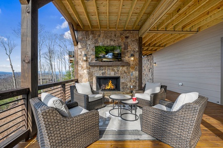 All In - Lower Level Deck Fireplace Seating Area