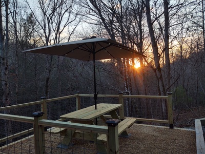 Creekside Getaway: New outdoor dining overlooking creek