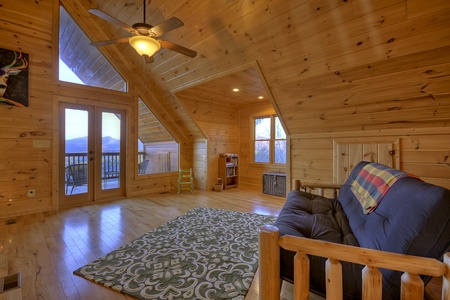 Bearcat Lodge- Upper level loft area with deck access