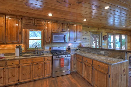 Grand Bluff Retreat- Kitchen area with counterspace & appliances