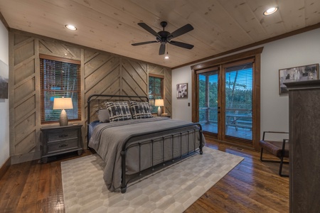 Southern Star- King bedroom on the entry level with deck access doors
