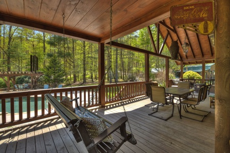 Stanley Creek Lodge- Deck swing overlooking guest house and barn
