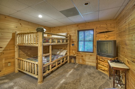 Hogback Haven- Lower level bunk room with a TV