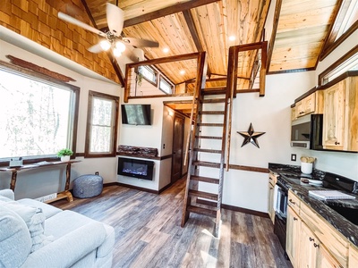 Misty Mountain Treehouse - Seating and Kitchen area looking to Loft