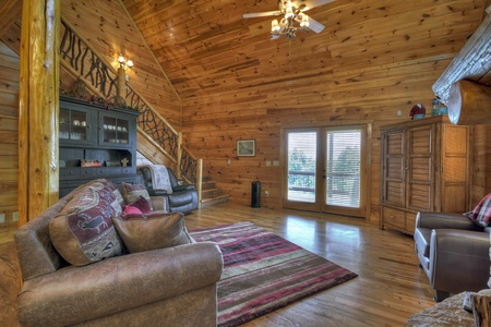 Above Ravens Ridge- Living room area with deck access