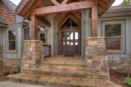 New Heights- Stone steps leading to he entrance to the cabin