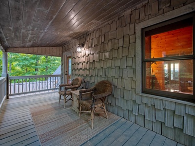 Aska Bliss- Outdoor deck seating and cabin entrance