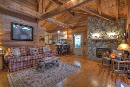 The Good Place- Entry level living area with view of the kitchen and entry door way