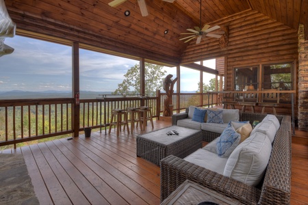 Grand Bluff Retreat- Entry level outdoor area with bar stool seating