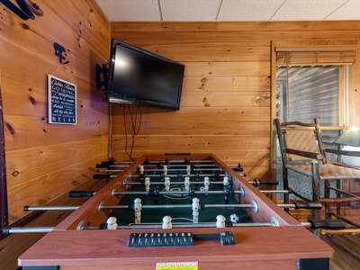 Bear Necessities- Lower level game room with a TV