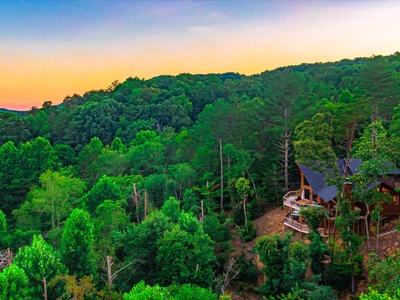 Whisky Creek Retreat- Aerial view of the cabin with mountain views