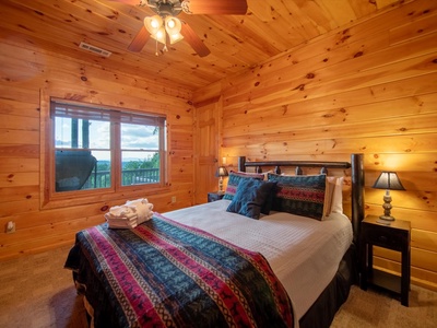 Aska Bliss- Lower level bedroom with a deck view