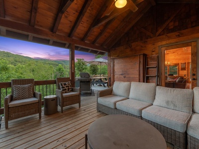 Whisky Creek Retreat- Lounge seating on the deck with mountain views