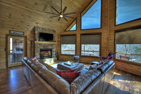 Whisky Creek Retreat-Living area with a fireplace and TV