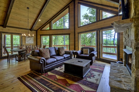 Vista Rustica- Living room area with floor to ceiling windows