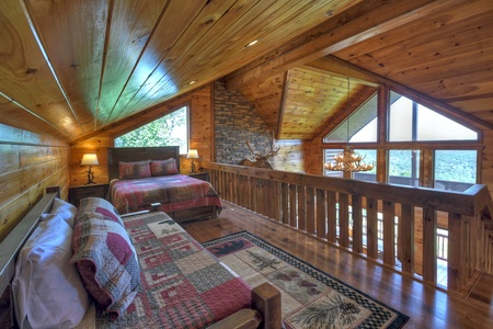 Grand Bluff Retreat- Loft view of twin bed and queen bed