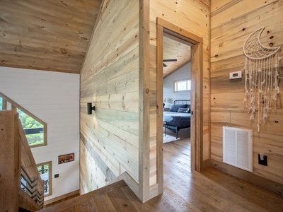 Dream Catcher- Upper level landing view of the staircase and bedroom