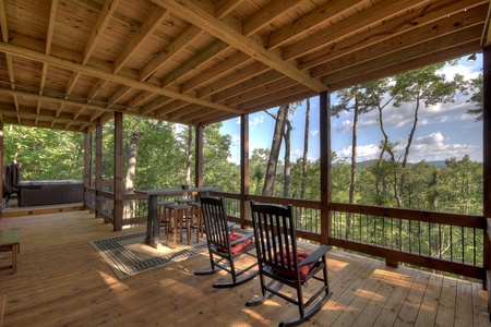 A Perfect Day- Lower level deck with rocking chairs and snack table