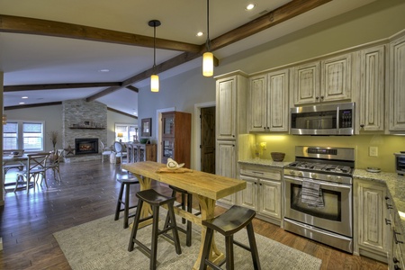 Main Street Cottage - Kitchen with living room in the background