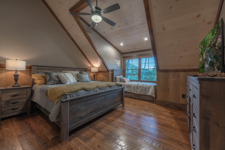 Southern Star- Upper level master bedroom with a day bed