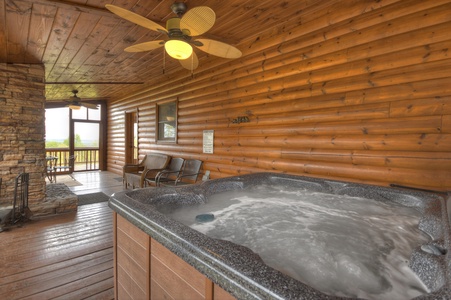 View From The Top- Outdoor deck area with a hot tub