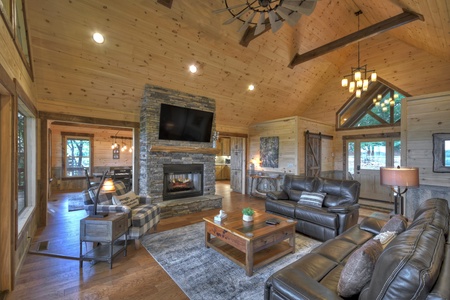 A Perfect Day- Living room space with a fireplace and TV