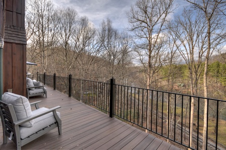 River Lodge- Deck seating with long range forest views